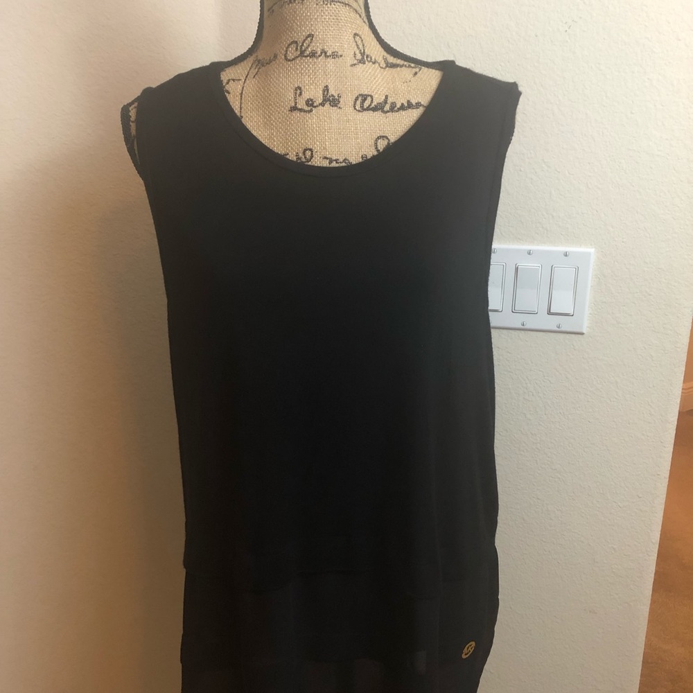 Black fabric and sheer top